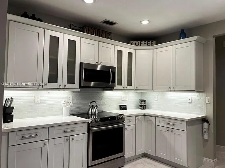 12591 NW 57th Pl #TOWNHOUSE — Photo 3
