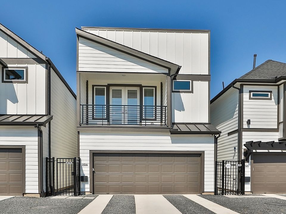 Sleek metal accents and spacious design elevate this Independence Heights townhouse to modern luxury