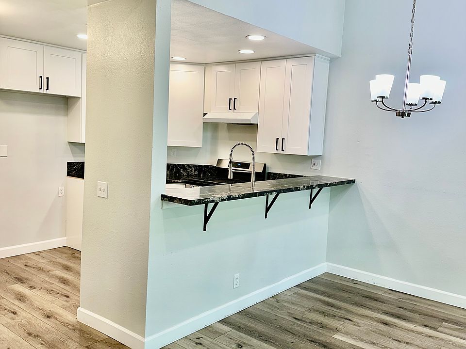 Breakfast bar for eat-in dining or additional seating when entertaining.