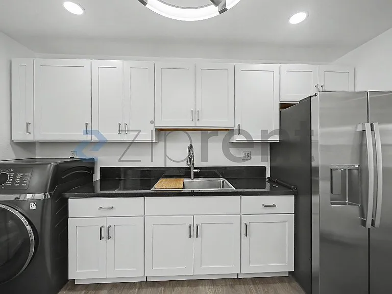 10907 S Burl Ave — Photo 9