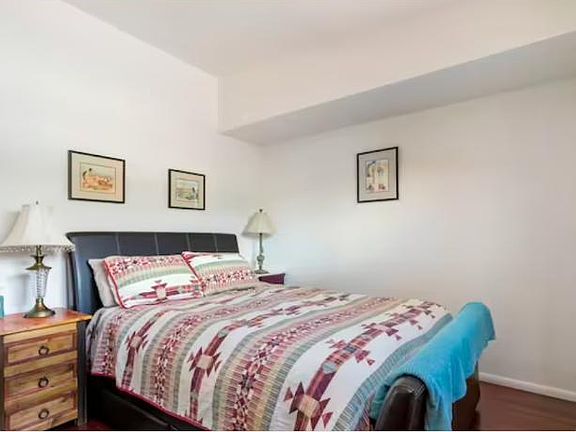 Comfy queen sleigh bed with storage drawers underneath both sides