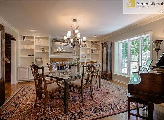 Large dining room with fireplace.