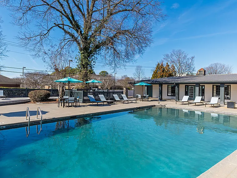 Experience tranquility at this serene poolside retreat, perfect for leisurely afternoons.