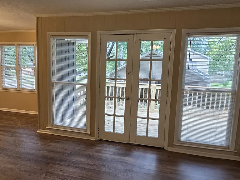 Glass French Doors leading to new wooden deck #2
