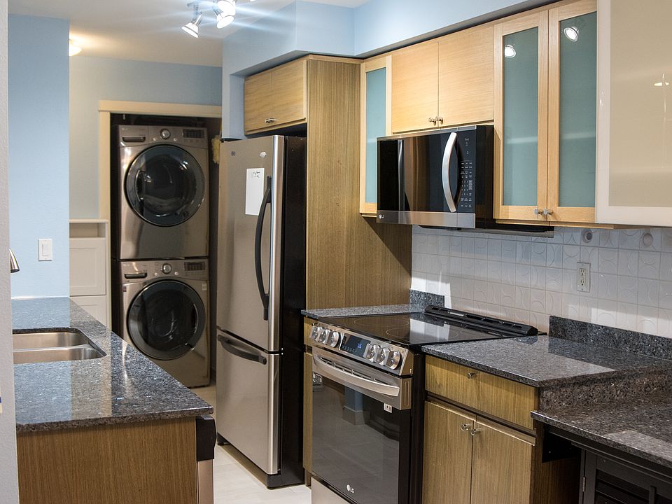 Kitchen with upgraded electric stove, oven and exhaust