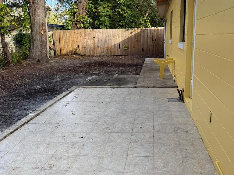 Tiled area which attaches to the main bedroom. Here you can relax after work in your private backyard.