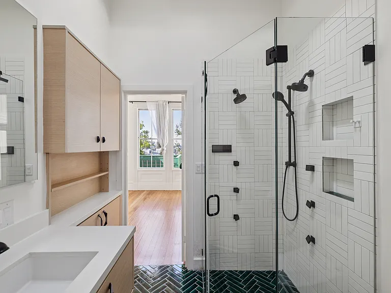 Recently remodeled bathroom with smart shower and soaking spray nozzles.
