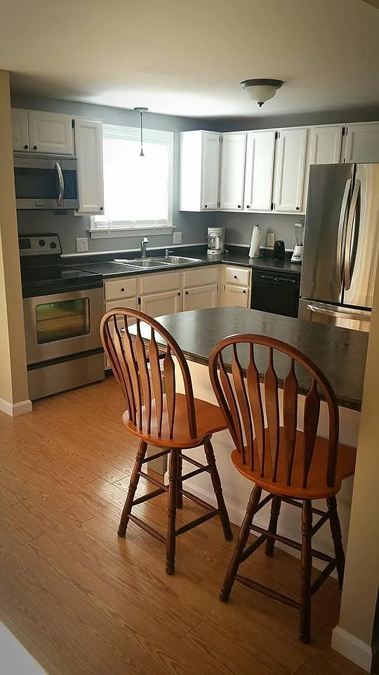 Kitchen with stainless steel appliances. - Orchard Hills Pkwy