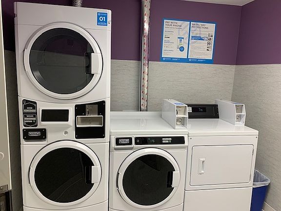 Common area laundry on each residential floor