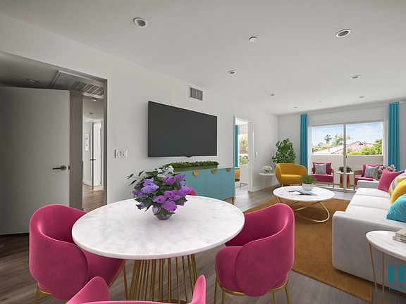 Open-Concept Dining and Living Room Space with a Patio