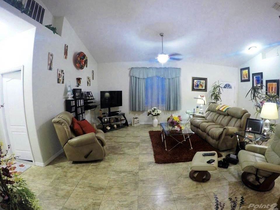 Living Room with Large 18X18 Ceamic Tiles