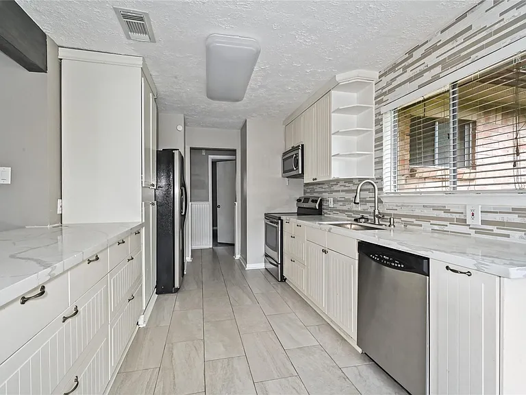 7310 Kite Hill Dr — Photo 10