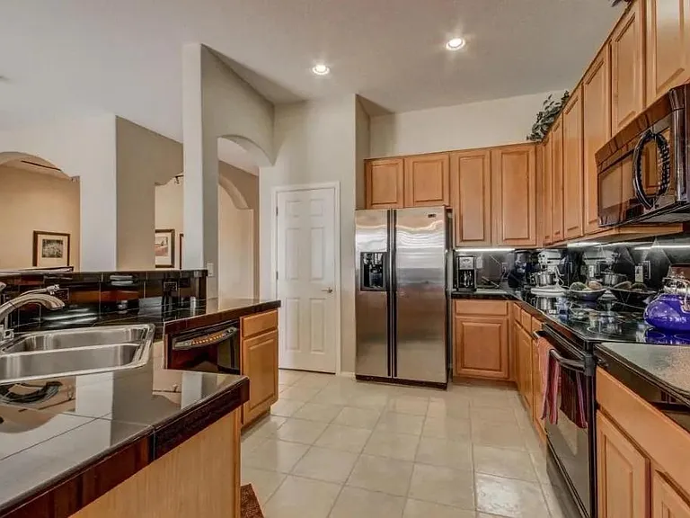 Beautiful, open kitchen to great room/living room area. Marble countertops, upgraded kitchen cabinets and appliances.