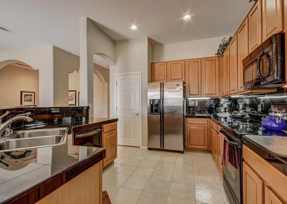 Beautiful, open kitchen to great room/living room area. Marble countertops, upgraded kitchen cabinets and appliances.