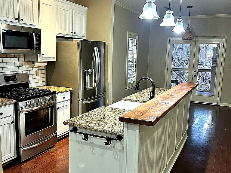 All stainless. Gas Stove, diswasher, new microwave,