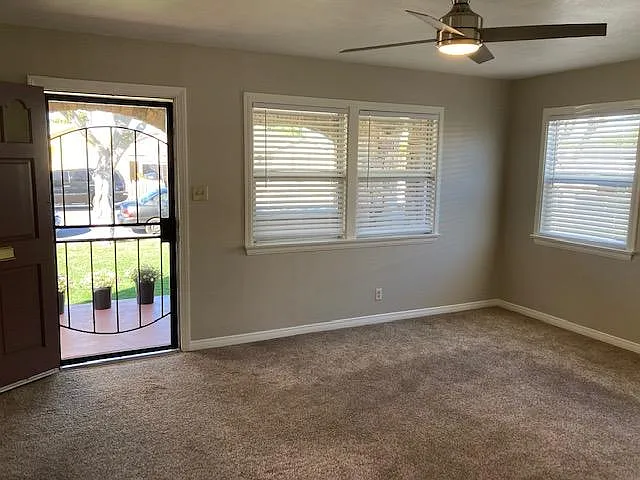 All rooms have ceiling fans and central A/C. Spacious living room.