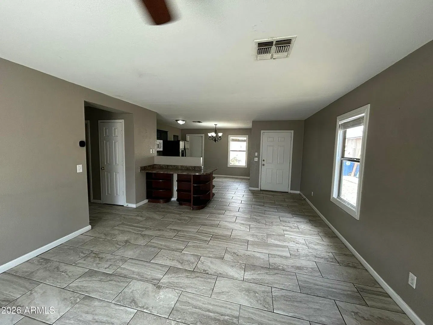 El Mirage Home with Tile Flooring Throughout — Photo 3