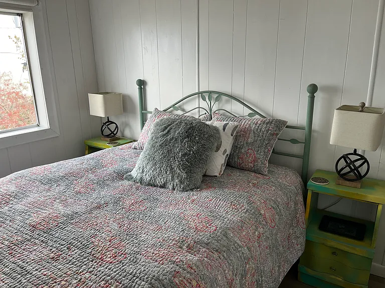 Bedroom #1 Iron bed, lamps and end tables