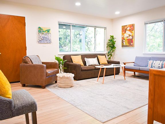 Living room and door leading to the back deck