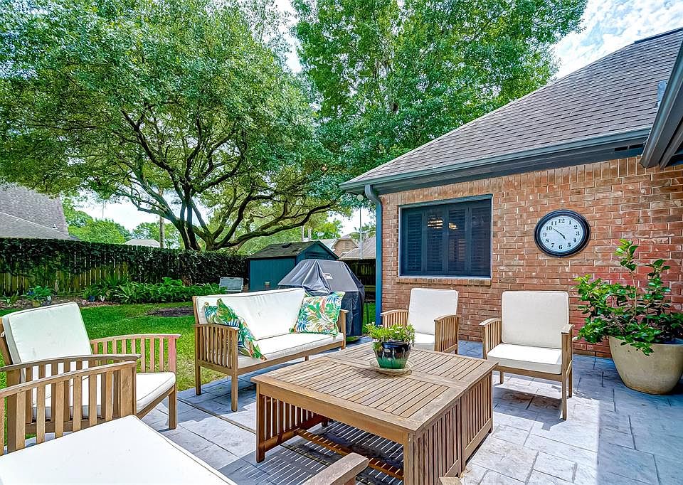 View of owners pride and joy! They have enjoyed this space tremendously and is a great space to unwind after a busy day. Morning sun, evening moonlight. Enjoy year round! 20x28 stamped concrete patio provides plenty of space to entertain. Grill out o