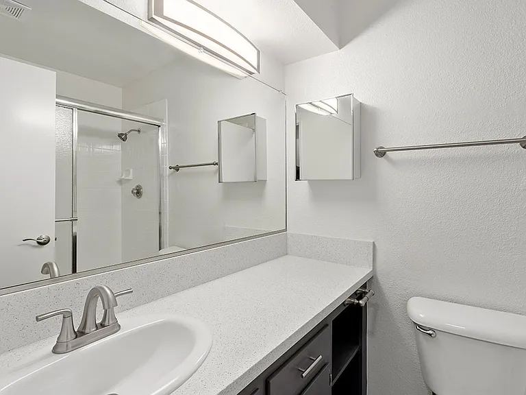 Modern styled bathroom with shower and tub.