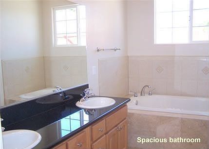 Bathrooms, master suite w/jacuzzi bath tub.