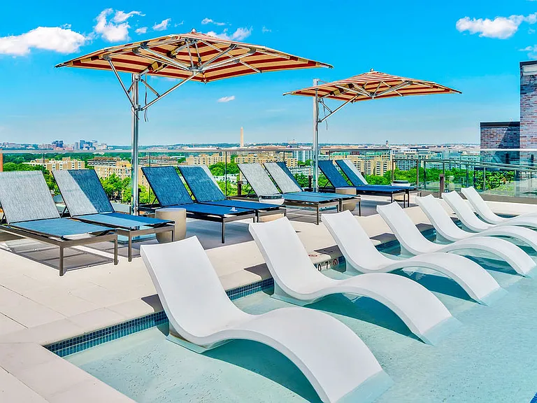 Rooftop pool overlooking Washington DC's waterfronts and cityscapes.