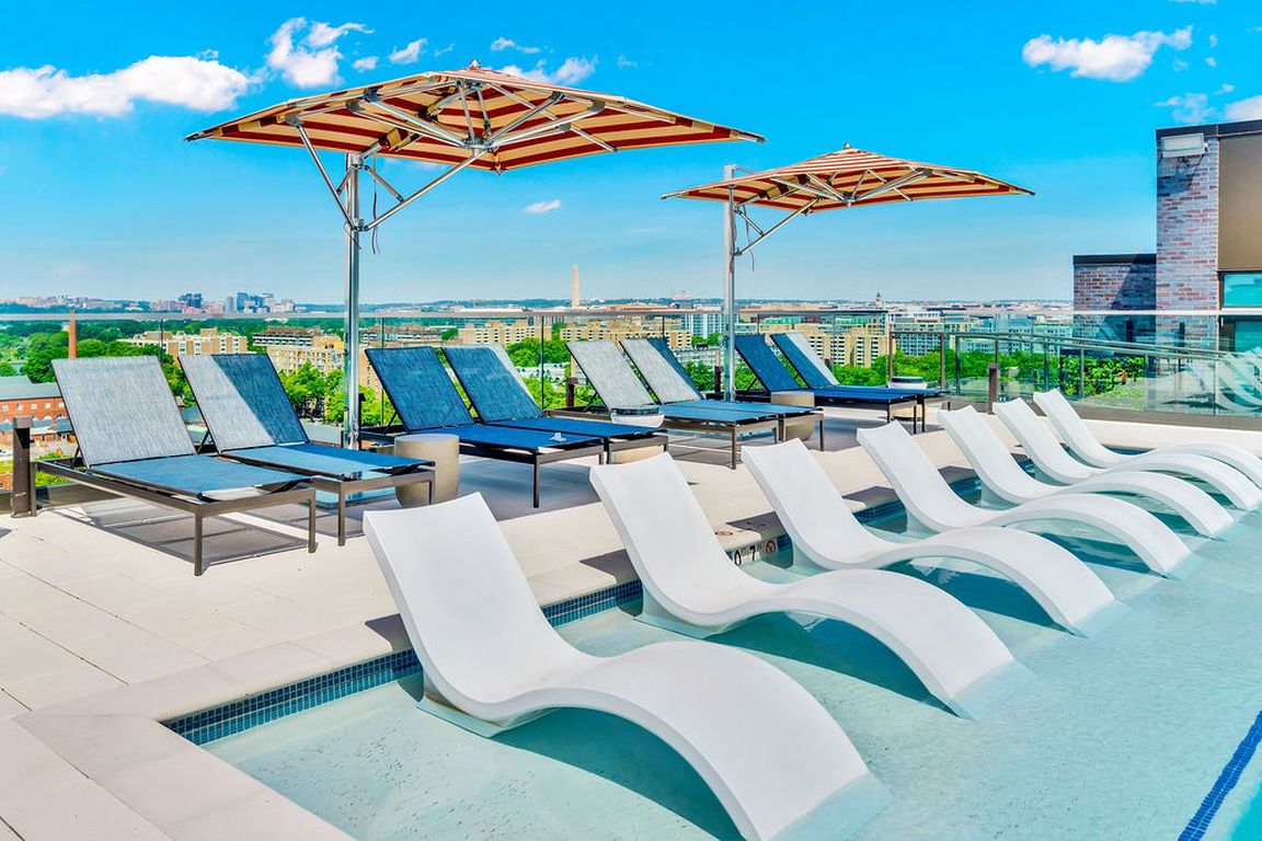 Rooftop pool overlooking Washington DC's waterfronts and cityscapes.
