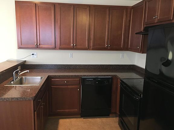 Full-size kitchen with generous cabinet storage.