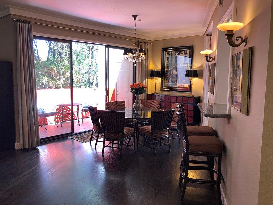Beautiful open dining room with McGuire plush seating for 6.