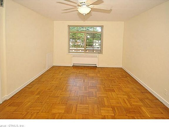 old photo before freshly painted to showsize of Bedroom, with plenty of storage