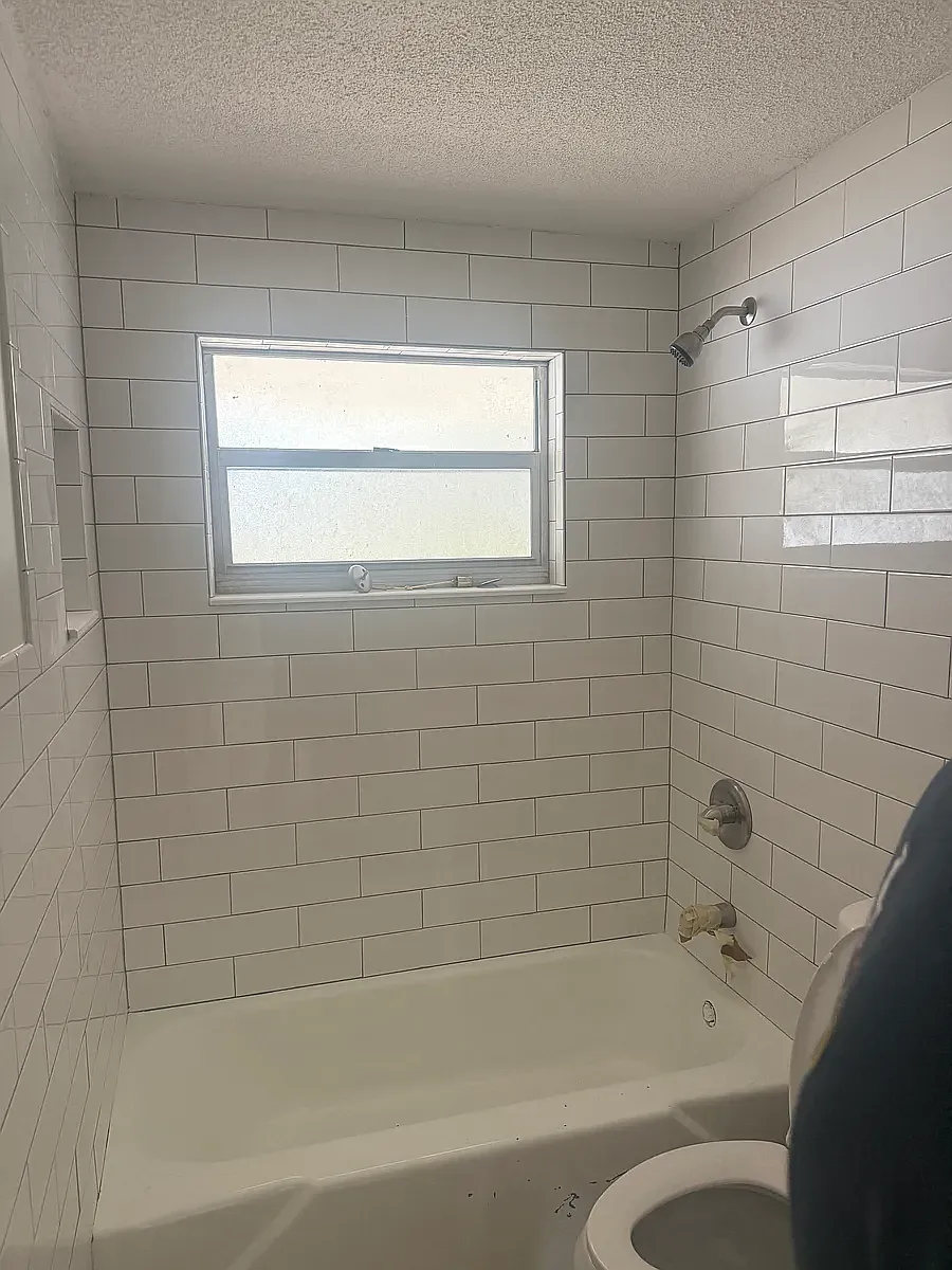 new tile, toilet and vanity - 801 E 13th Ave