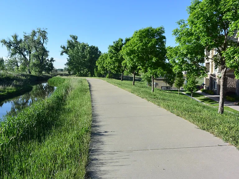 Walking path behind Michael Place Apartments