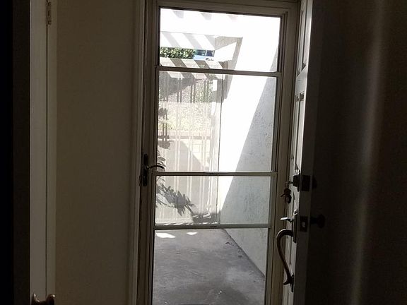 Storm screen door.
