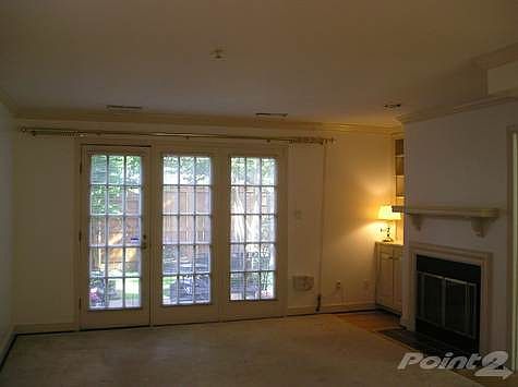 Living Area w/ Fireplace, French Doors