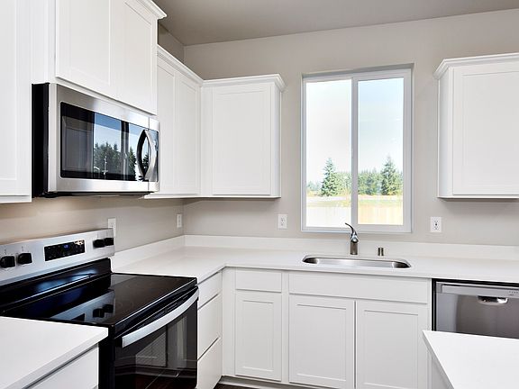 Each kitchen comes with stainless steel appliances included.
