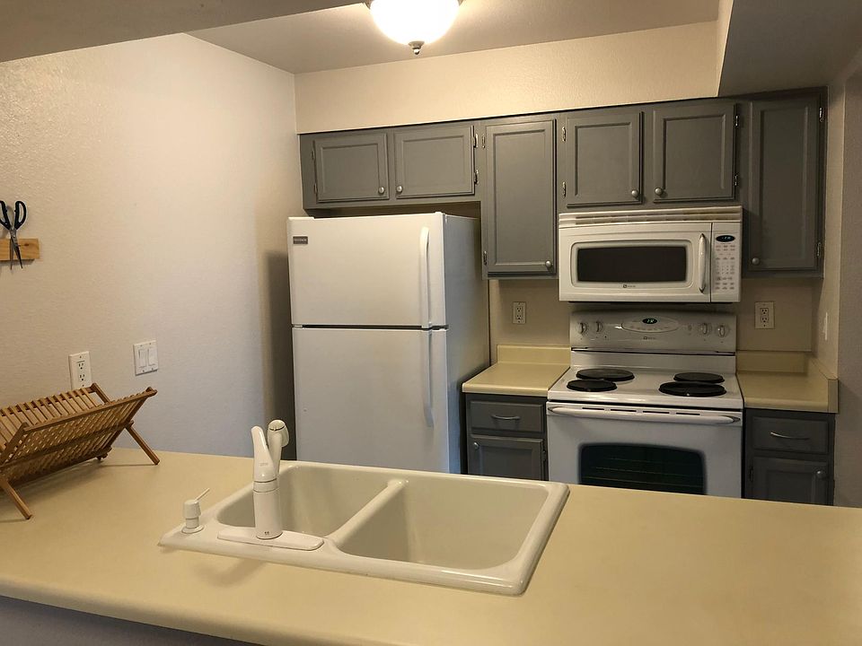 Painted cabinets and dishwasher is also included.