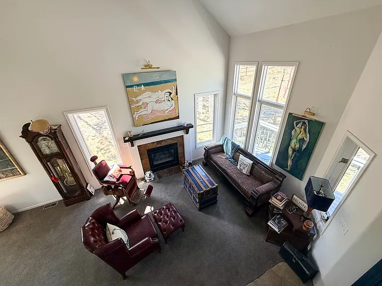 View of entry living space from 2nd floor bedrooms