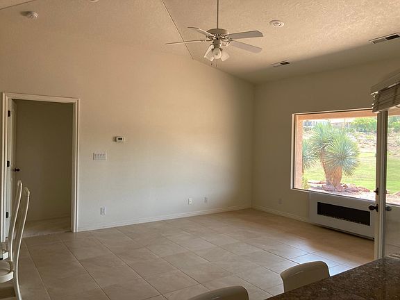Living room with decorative fireplace.