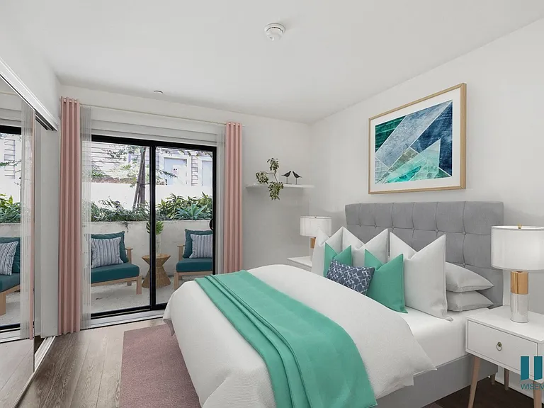Bedroom with Mirrored Closet and Patio