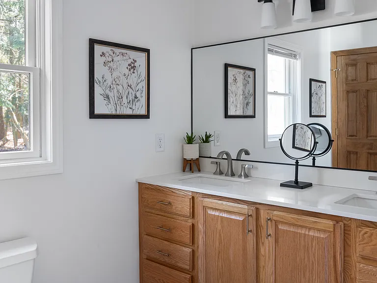 Renovated ensuite bathroom with double vanity