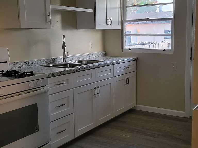 KITCHEN ALL NEW CABINETS, GOOD WORKING STOVE/REFRIGERATOR