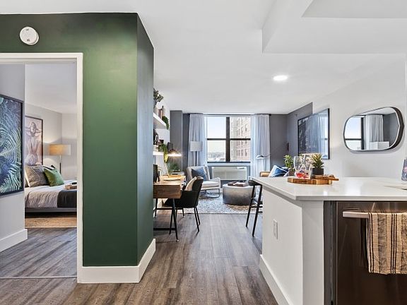 Open floor plan of kitchen looking into living room