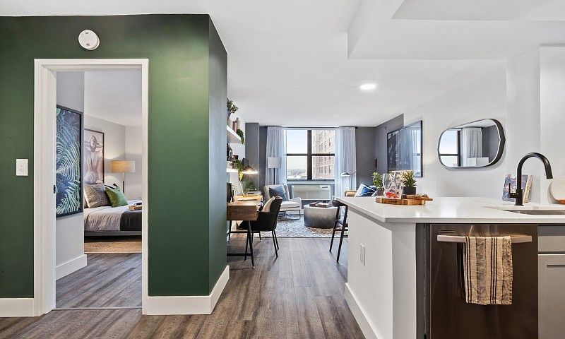 Open floor plan of kitchen looking into living room