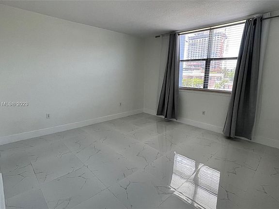 4th image of 401 69th St APT 205
