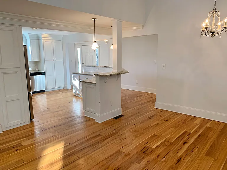 Dining area is directly off of kitchen island.