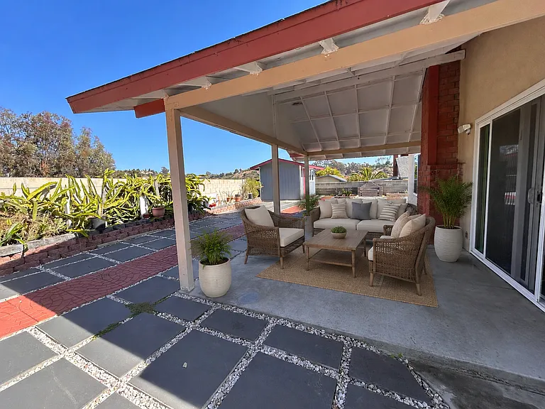 Backyard with patio furniture.
