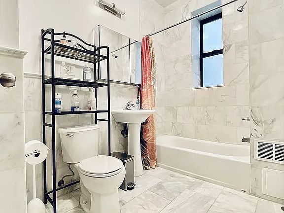 2nd image of 218 E 11th St APT 1