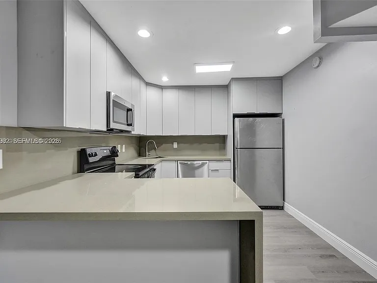 5963 NW 25th Ct #210 — Photo 14