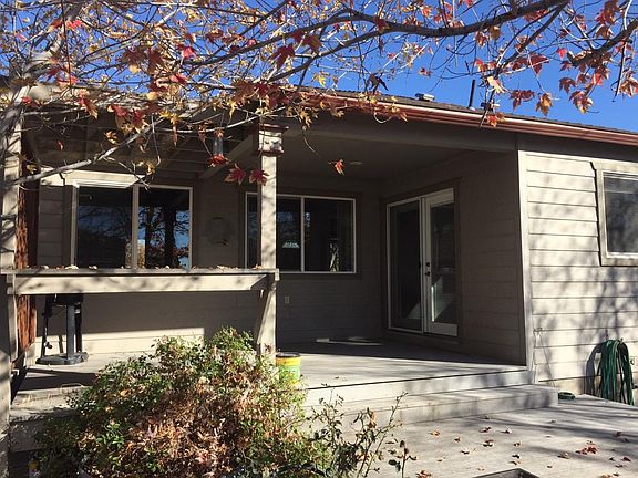 Front house (2000 sqft), Back of house showing the covered deck